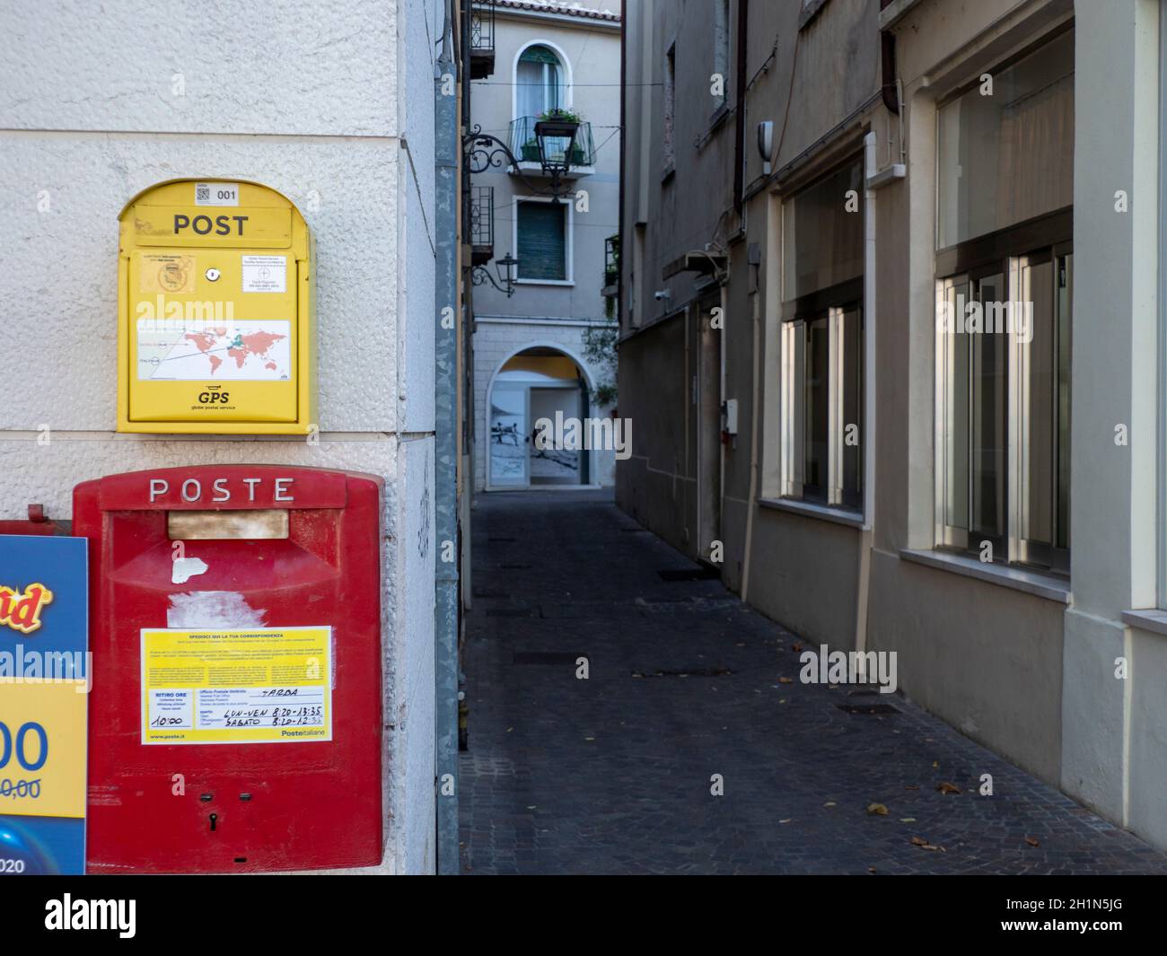 Mailboxes of Globe Postal Service and Italian Post in Garda besides an  Empty Street Stock Photo - Alamy