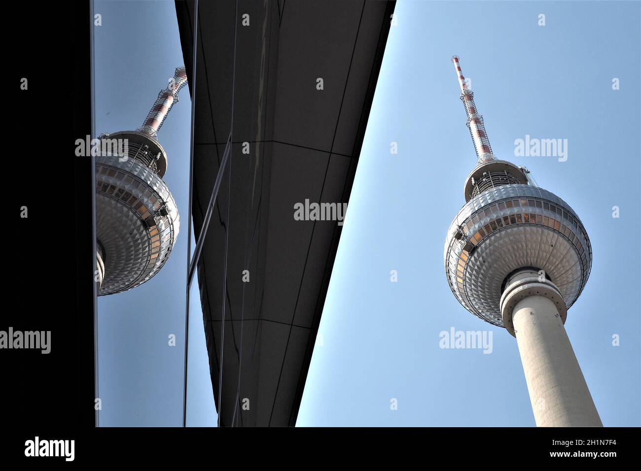 Mirroring of Radio Tower Alex in the Facade of a Building - Berlin Stock Photo
