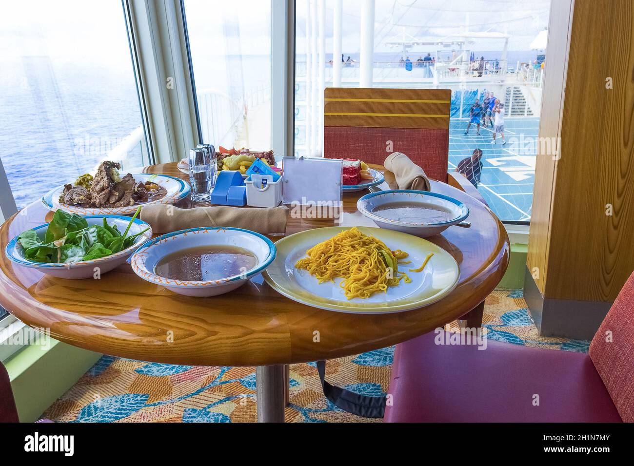 Cape Canaveral, USA - APRIL 29, 2018: The table with dishes at Dining Room  Buffet aboard the luxury cruise ship Oasis of the Seas by Royal Caribbean  Stock Photo - Alamy, image size:1300x956