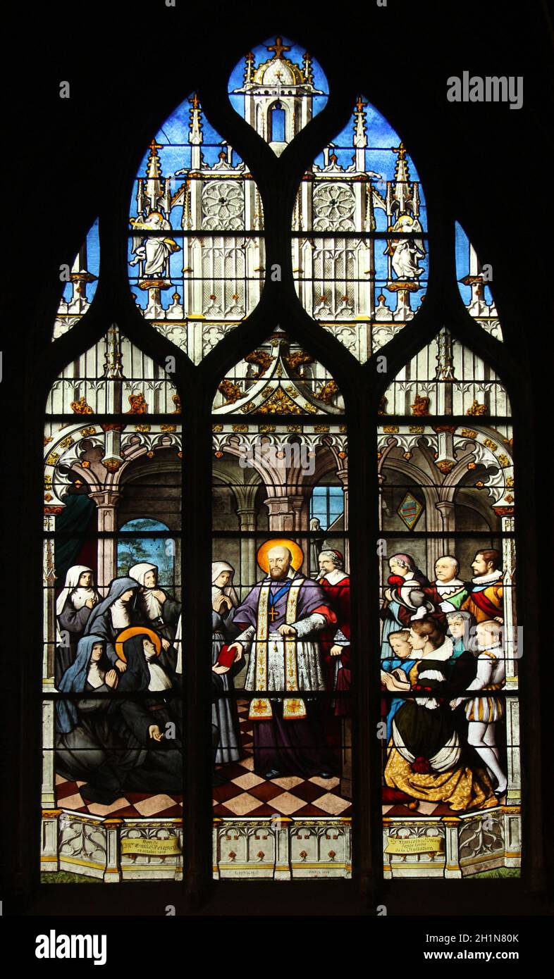 St. Francis de Sales handing Saint Jeanne de Chantal in the constitutions of the Order of the