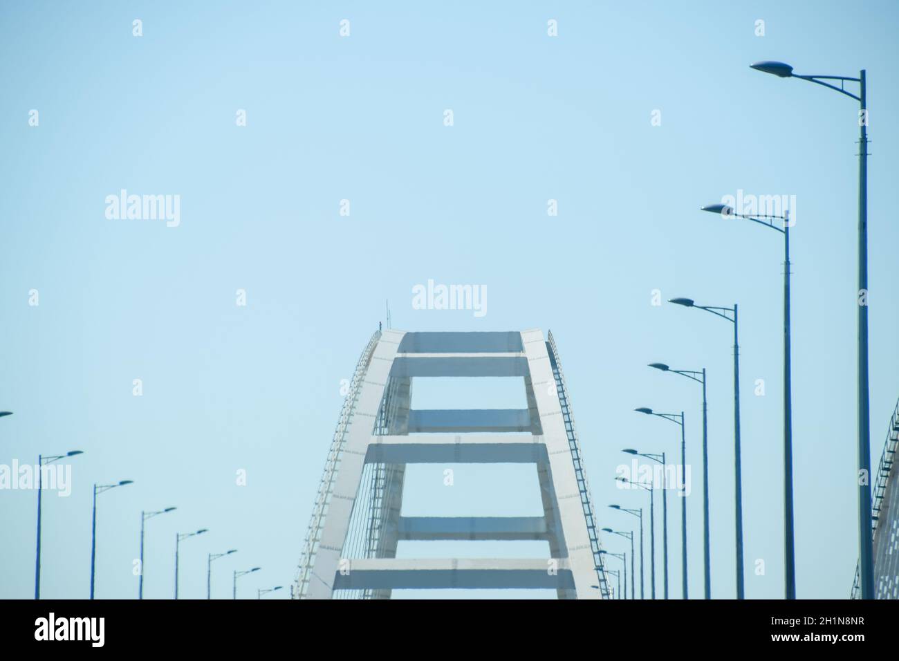 The navigable arch of the Crimean bridge. Arch of the highway and railway section of the Crimean bridge. Driving along the Crimean bridge. A grandiose Stock Photo