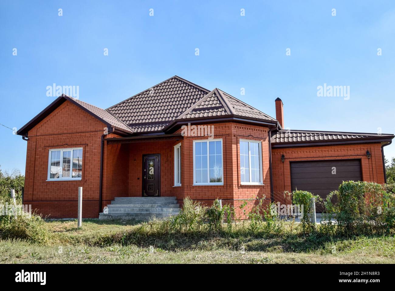 Detached house with a roof made of steel sheets. Roof metal sheets ...