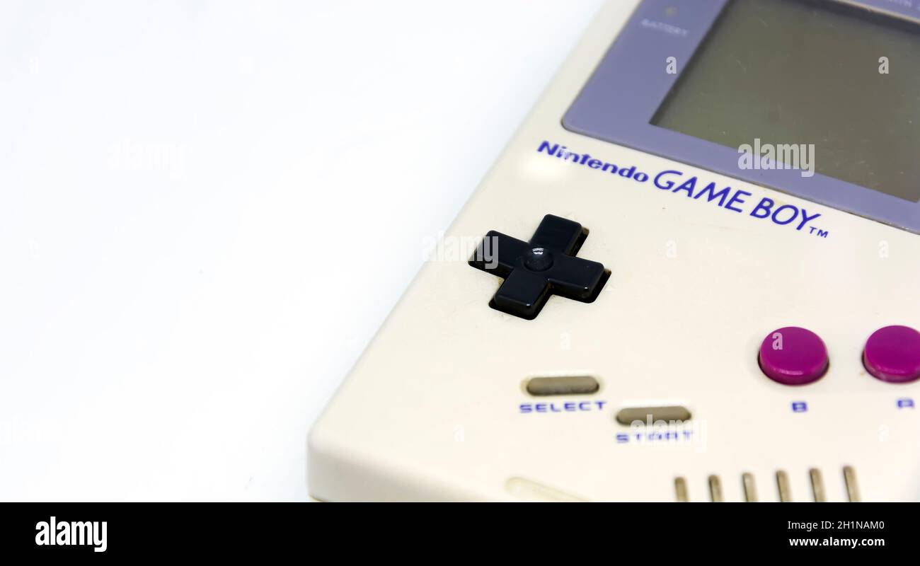 Rome, Italy, December 23, 2020: The Gameboy portable video game console from Nintendo isolated on a white background. Vintage video game console from Stock Photo