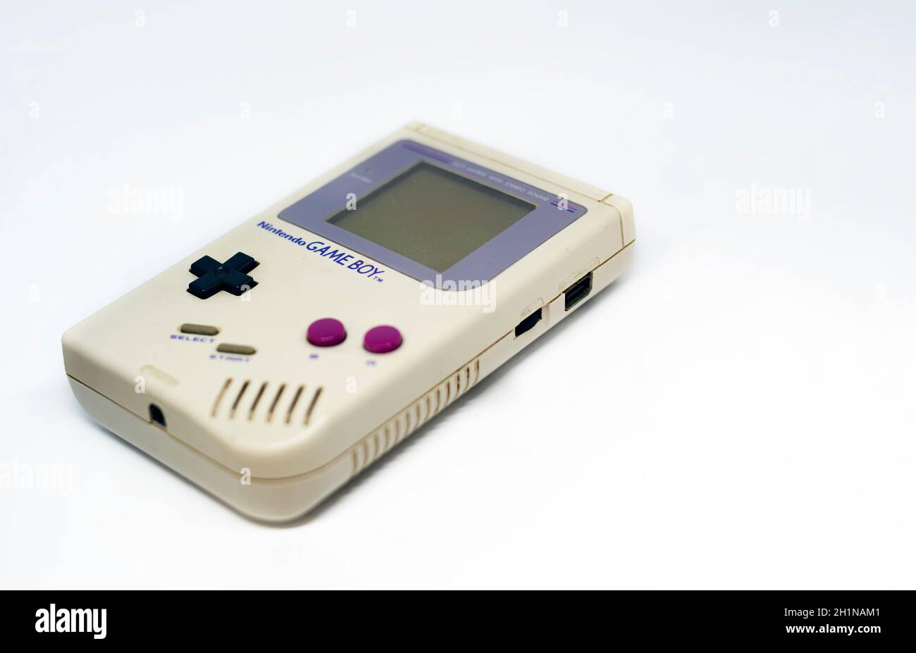 Rome, Italy, December 23, 2020: The Gameboy portable video game console from Nintendo isolated on a white background. Vintage video game console from Stock Photo