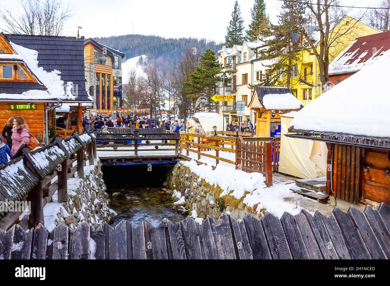 Zakopane, Poland - January 2, 2019: People walking at Krupowki street in Zakopane, Poland. Stock Photo