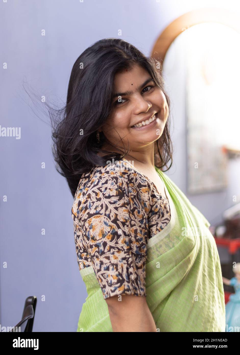 Portrait of a beautiful Indian woman in green saree Stock Photo - Alamy