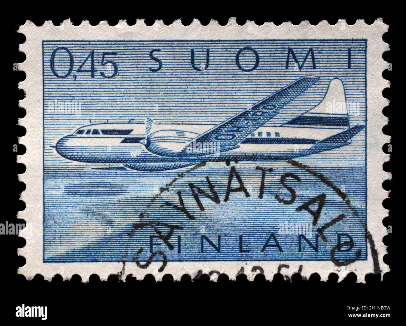 Stamp printed in Finland shows Aircraft Convair 440 over Lake Landscape, circa 1963 Stock Photo