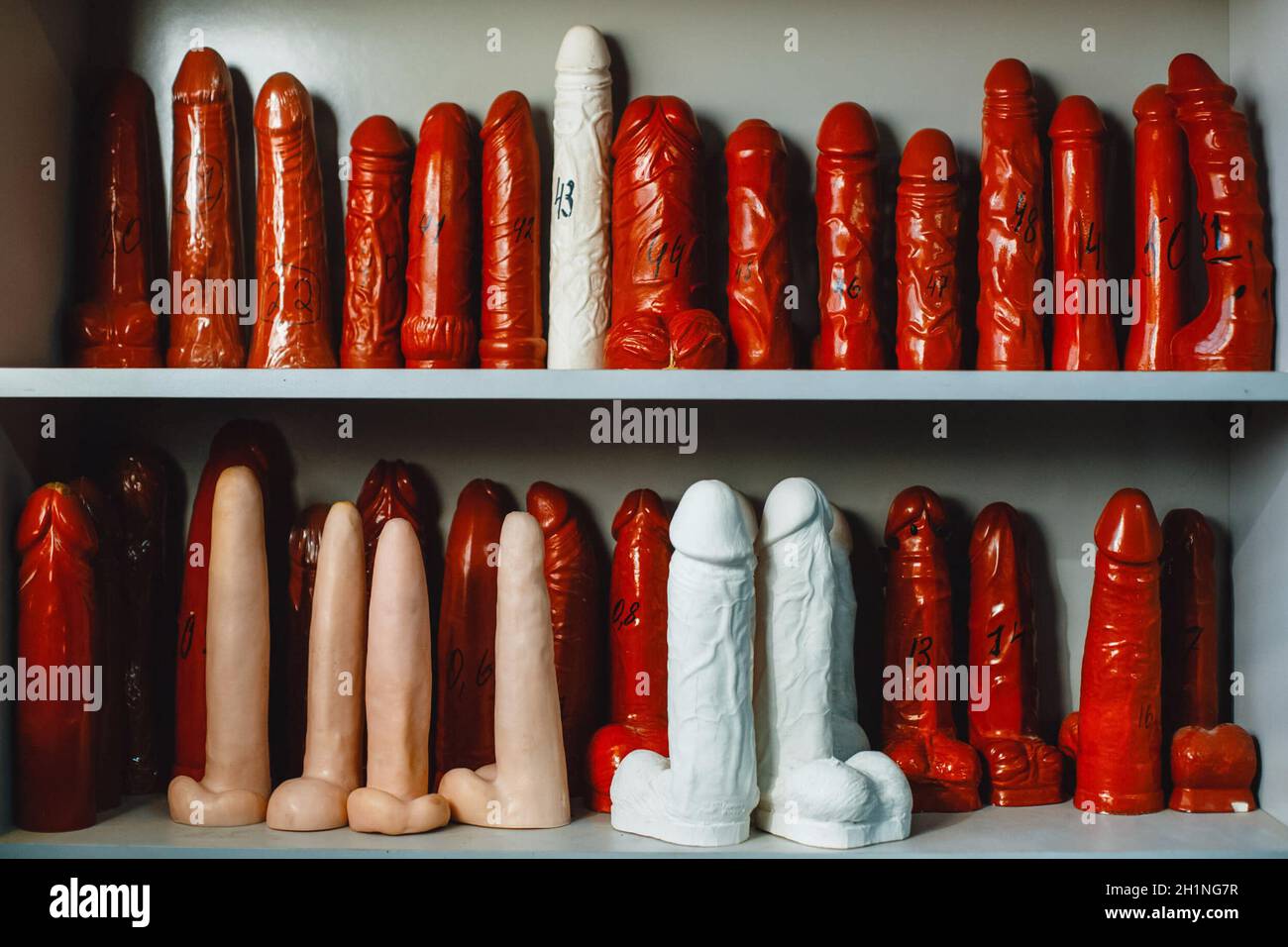 Storage of rubber products for sex shops. Warehouse products of the plant  of rubber products. Rubber sexual organs Stock Photo