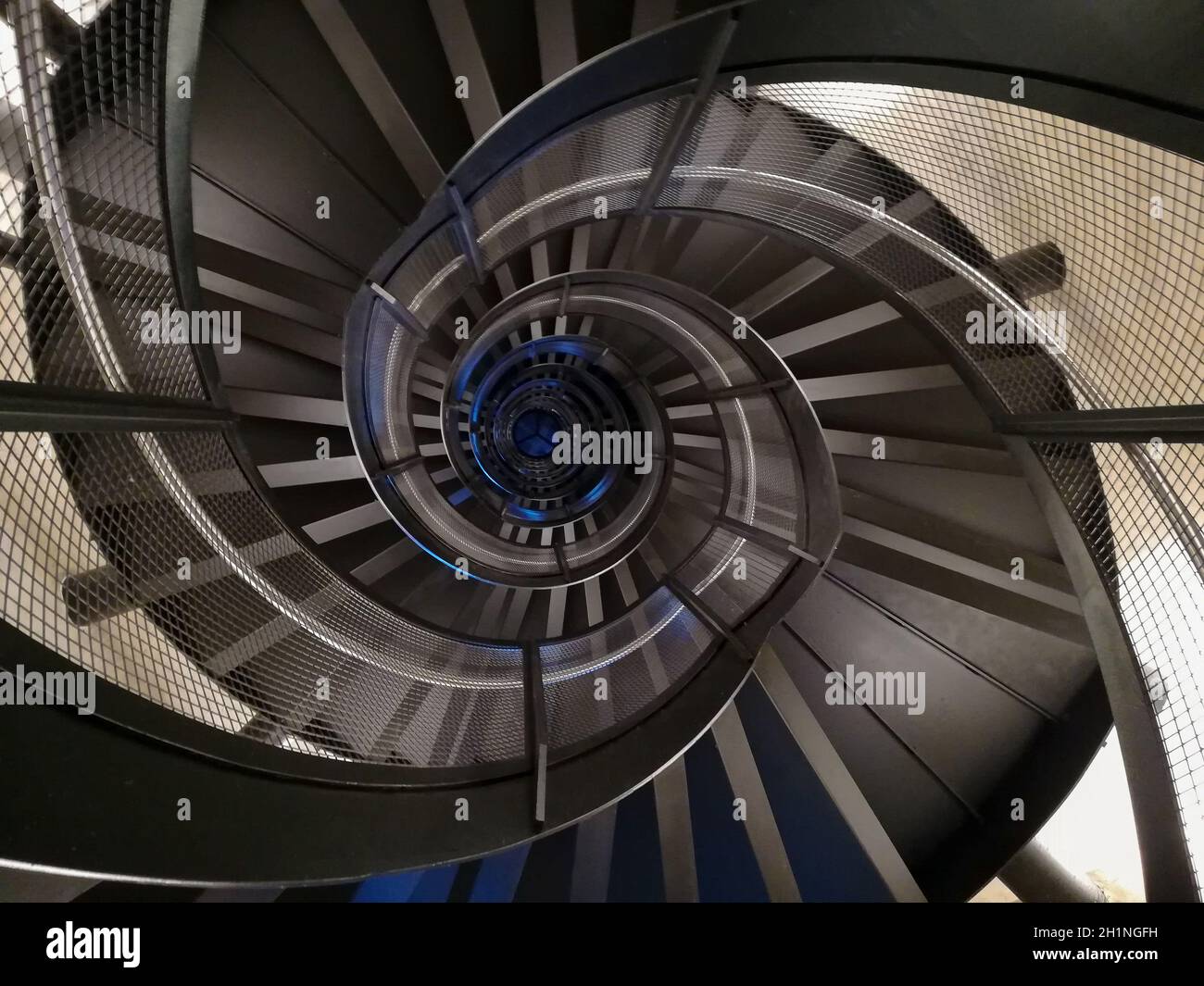 Spiral staircase bottom view. Geometric background Stock Photo