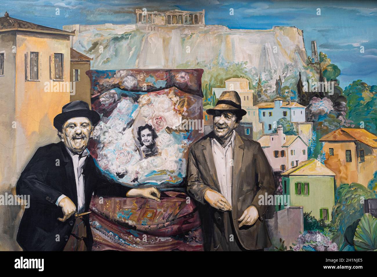 mural on a restaurant in the Plaka district and the Yiasemi public