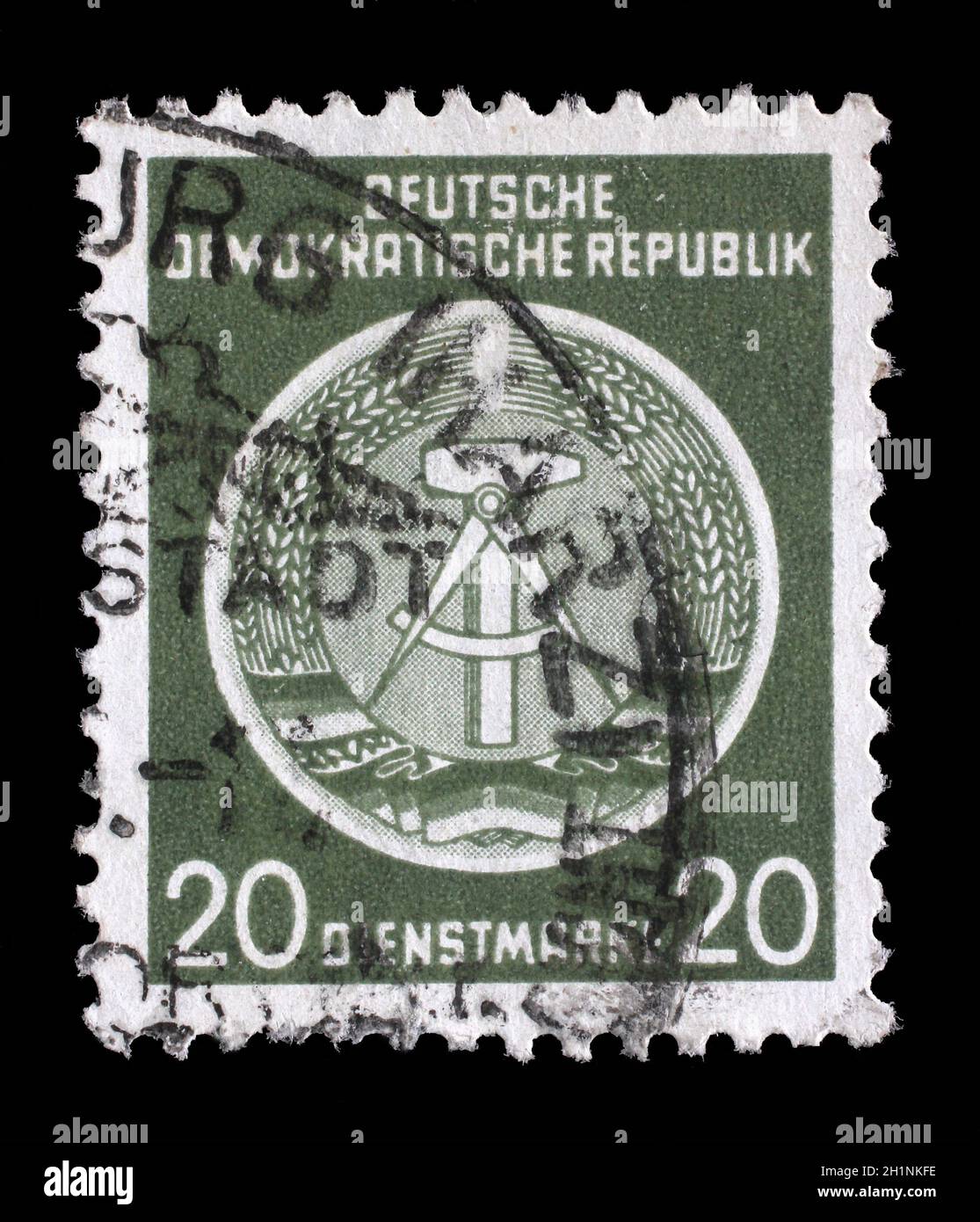 Stamp printed in GDR (German Democratic Republic - East Germany) shows DDR national coat of arms with inscription Service Stamp, series GDRs national Stock Photo