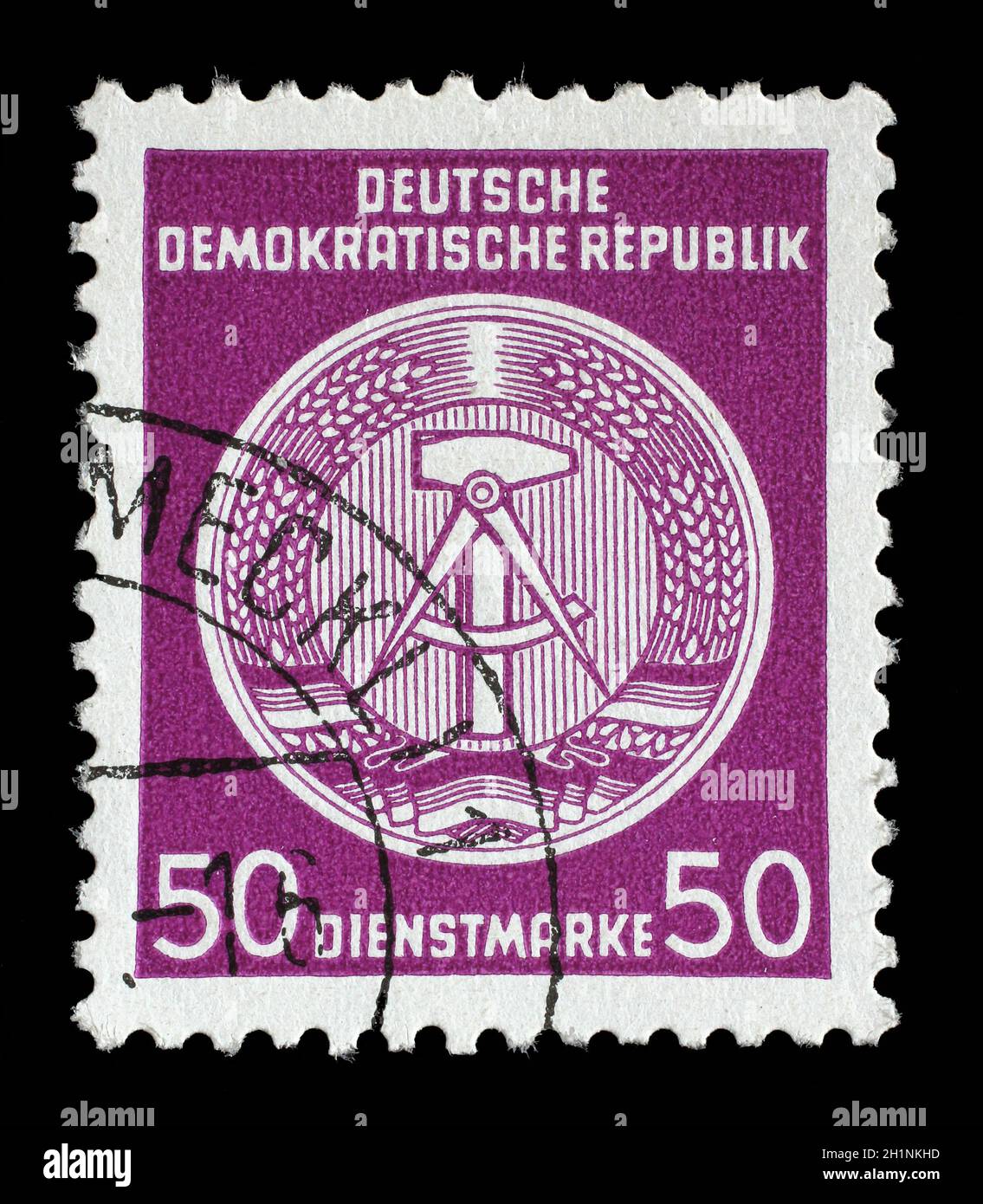 Stamp printed in GDR (German Democratic Republic - East Germany) shows DDR national coat of arms with inscription Service Stamp, series GDRs national Stock Photo