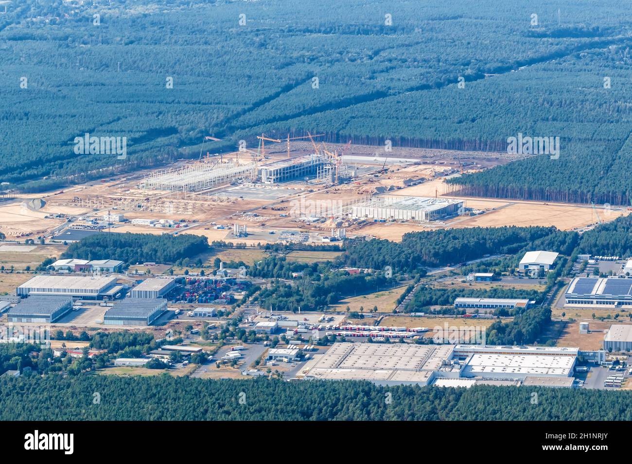 Berlin, Germany - August 19, 2020: Tesla Gigafactory Berlin Brandenburg Giga Factory construction site aerial view photo in Germany. Stock Photo