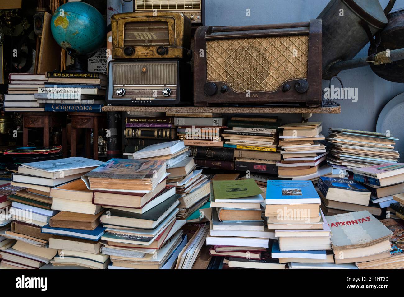 used books and radios for sale at a street market in Athens, Greece Stock Photo