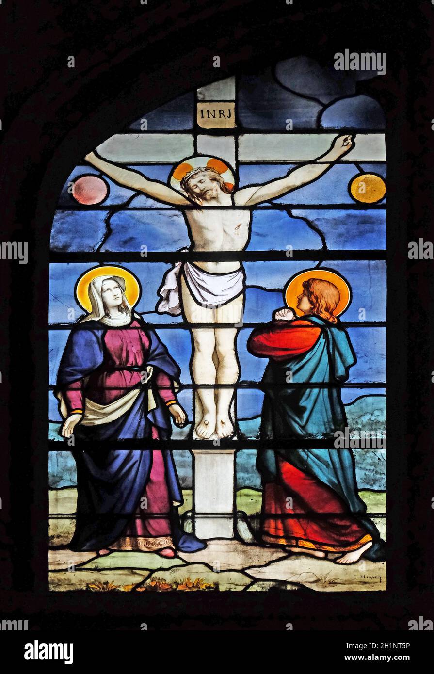Virgin Mary and Saint John under the Cross, stained glass window in Saint Severin church in Paris, France Stock Photo