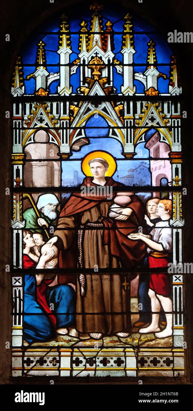 Saint Anthony distributes bread, stained glass window in Saint Severin ...