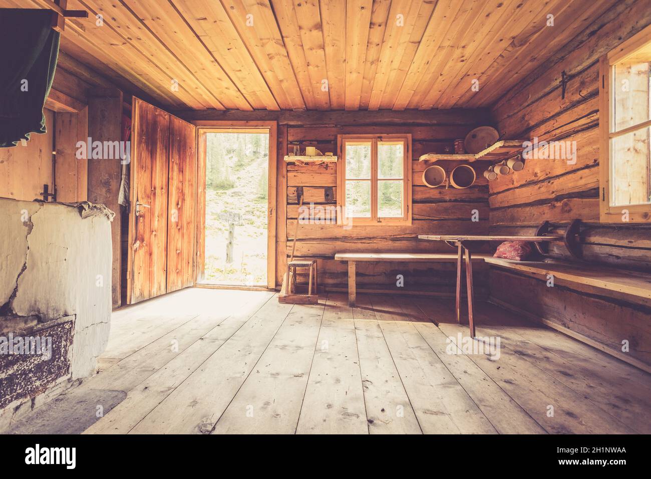 Interior of an old rustic abandoned alpine chalet in Austria Stock Photo