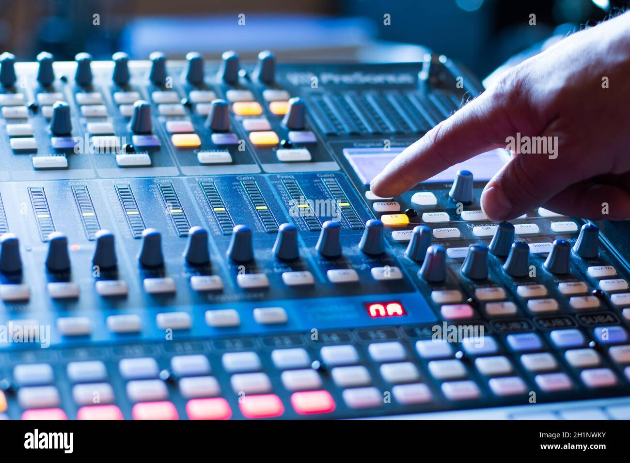 Professional music production in a sound recording studio, mixer desk ...
