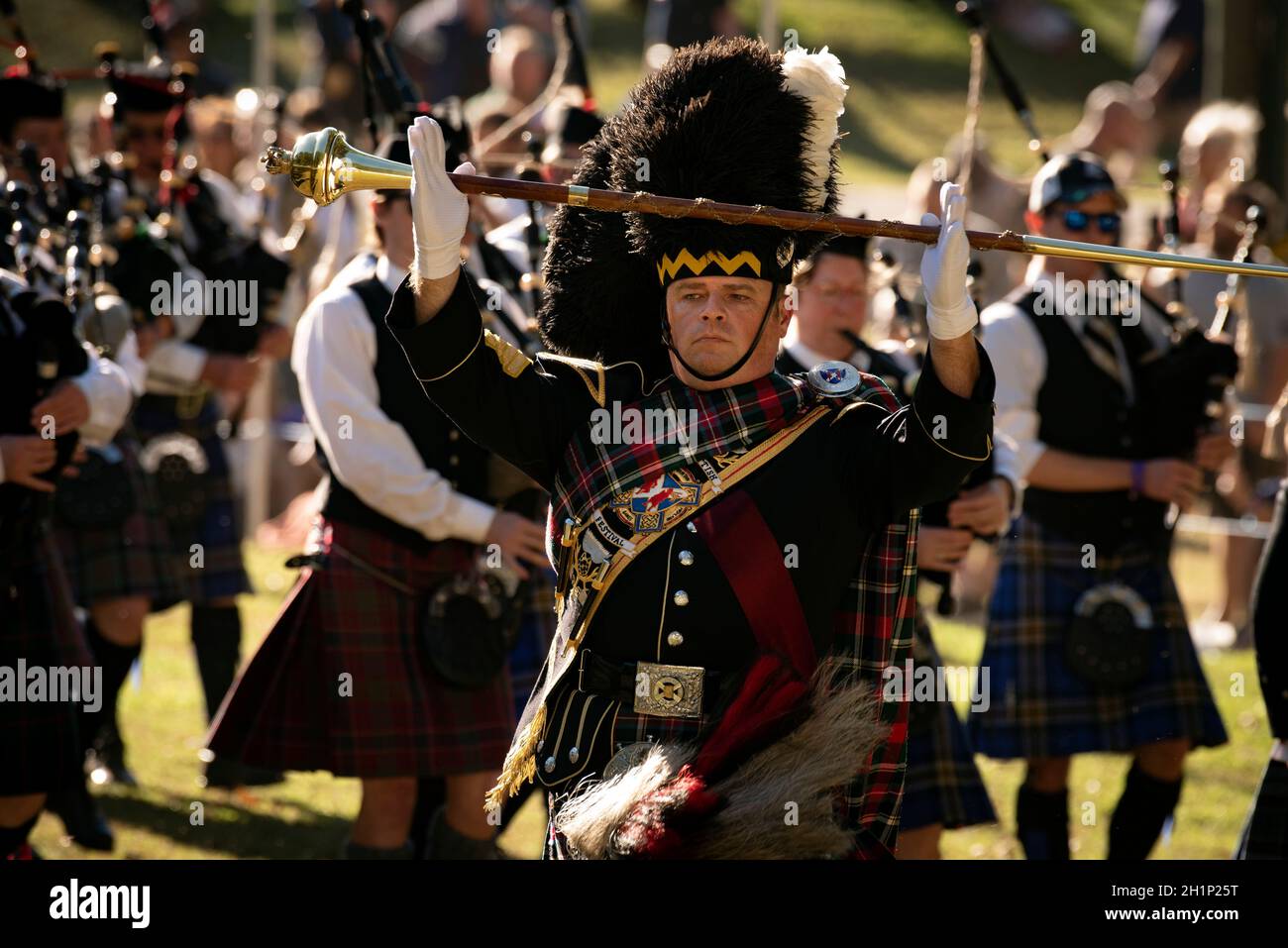 Stone Mountain, Georgia, USA. 16th Oct, 2021. Senior Drum Major Kevin Conquest leads massed pipe bands for closing ceremonies at GeorgiaÃs Stone Mountain Scottish Highland Games, resuming after two-year hiatus Oct. 16. (Credit Image: © Robin Rayne/ZUMA Press Wire) Stock Photo