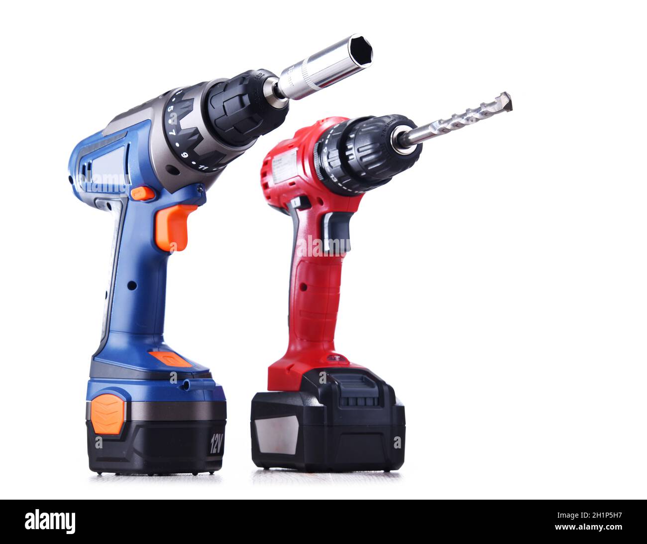 A screw gun and a pistolgrip cordless drill isolated on white