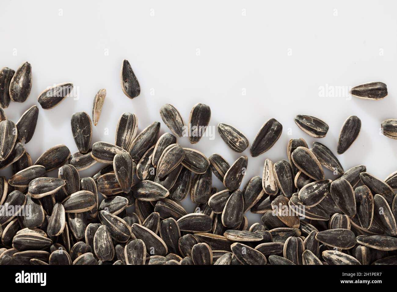 Whole unpeeled sunflower seeds hi-res stock photography and images - Alamy