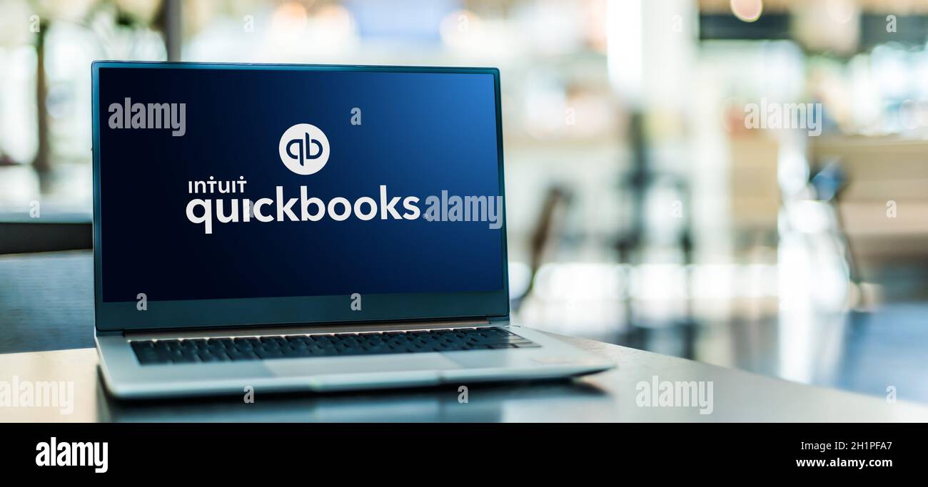 POZNAN, POL - SEP 23, 2020: Laptop computer displaying logo of QuickBooks, an accounting software package developed and marketed by Intuit Stock Photo