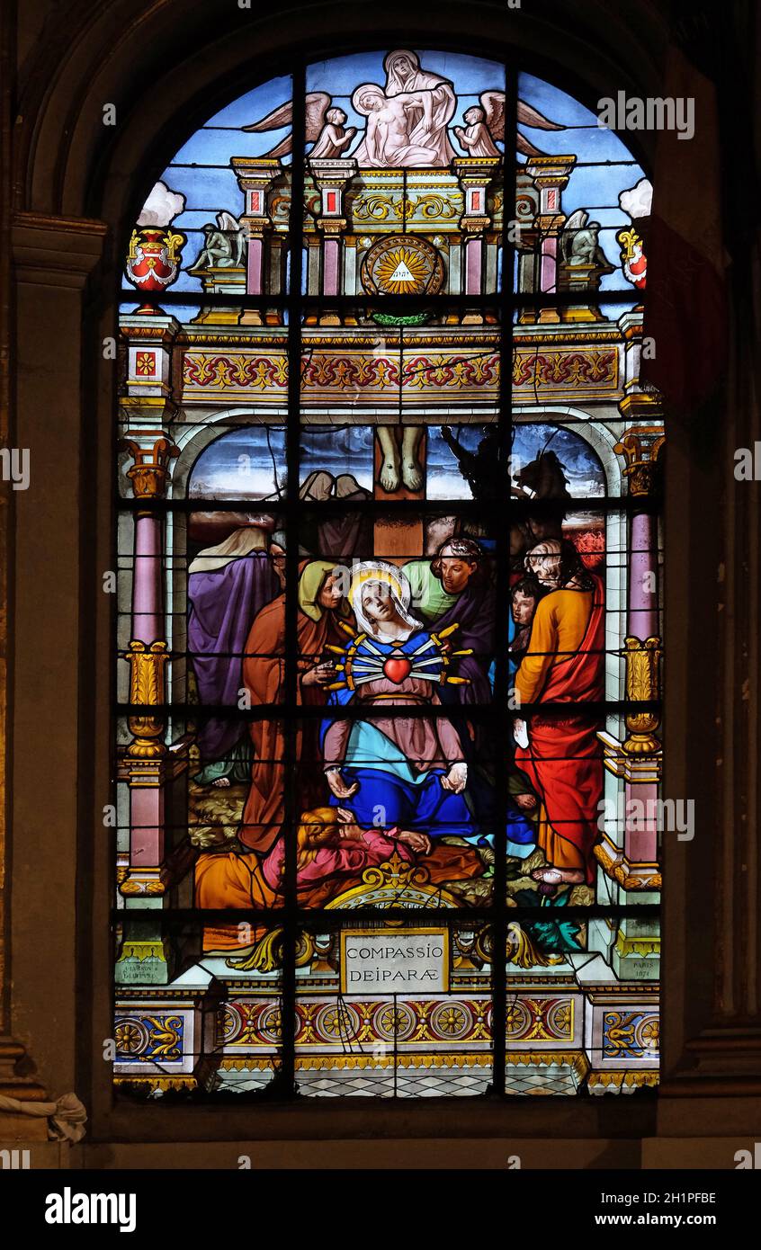 Seven Sorrows of the Virgin Mary, stained glass windows in the Saint Laurent Church, Paris, France Stock Photo