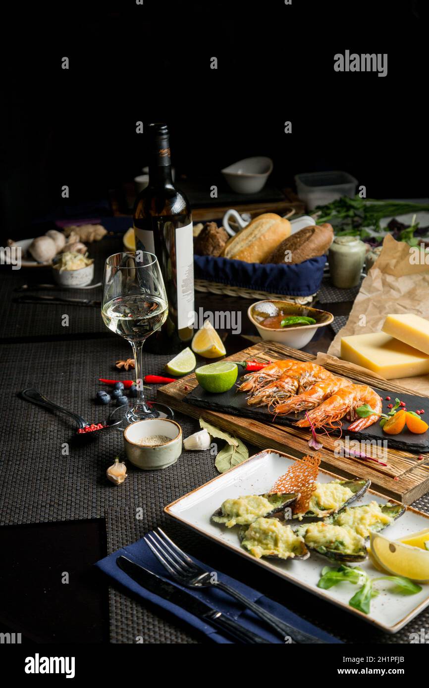 glass of semidry white wine, an aperitif. Wine with grilled meat and