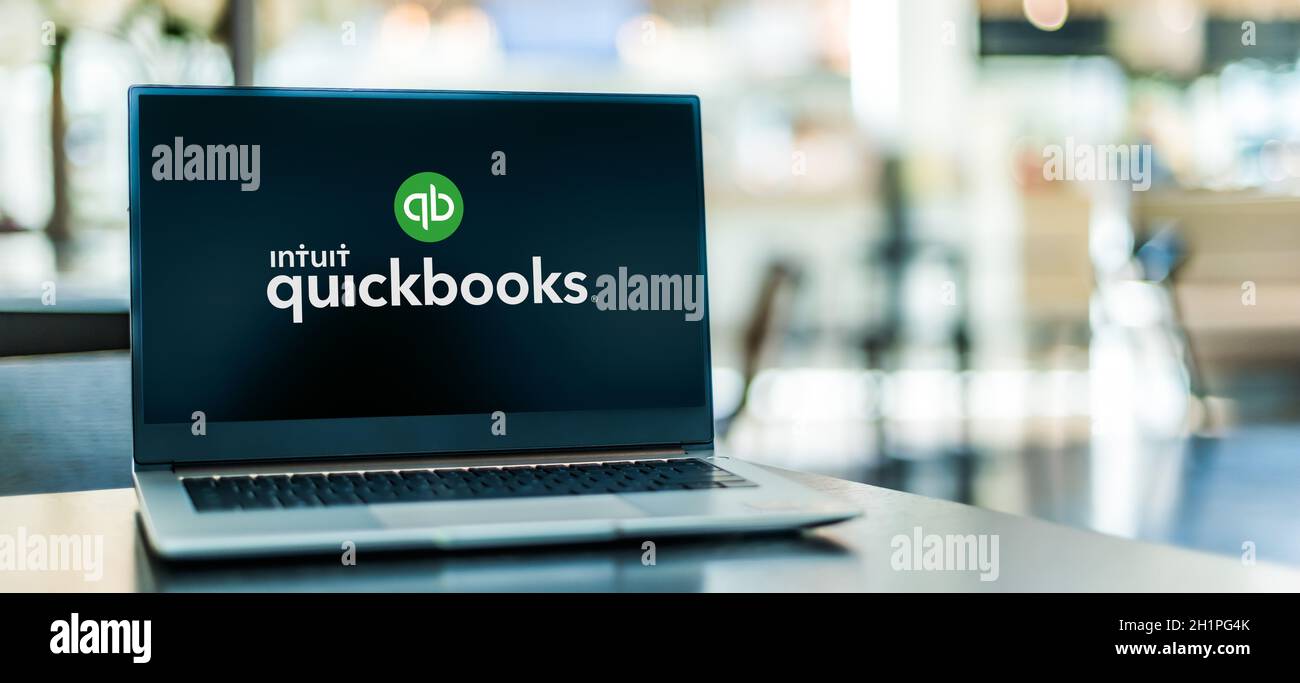 POZNAN, POL - SEP 23, 2020: Laptop computer displaying logo of QuickBooks, an accounting software package developed and marketed by Intuit Stock Photo
