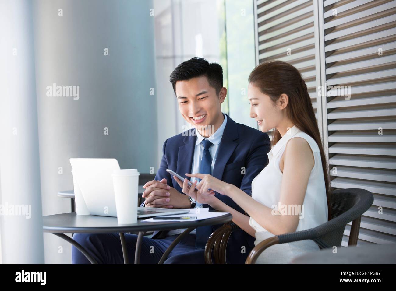 Businessmen working outdoors Stock Photo