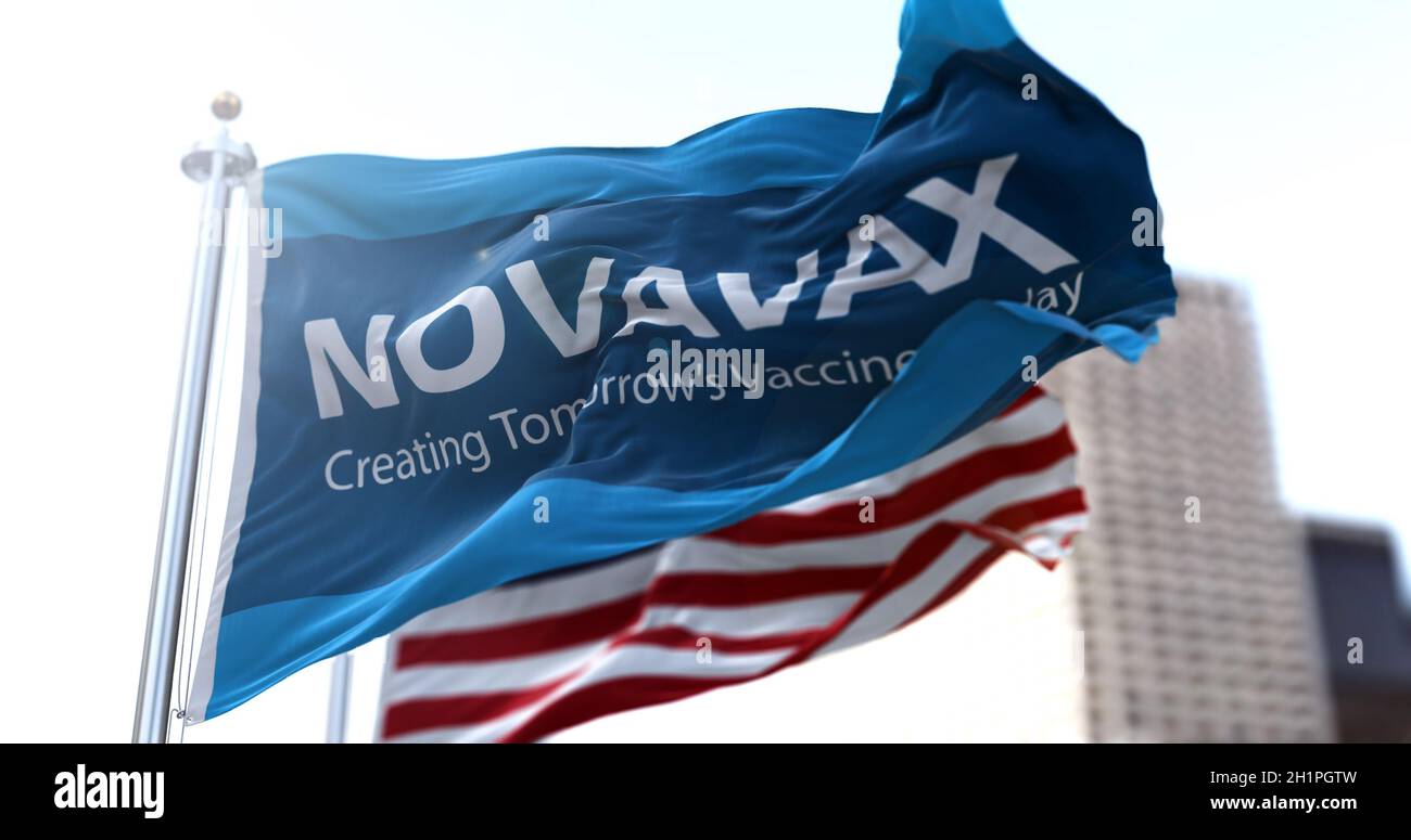 Gaithersburg, MD, USA, January 28, 2021: flag with the Novavax logo waving in the wind with the American flag in the background. Novavax announced dev Stock Photo