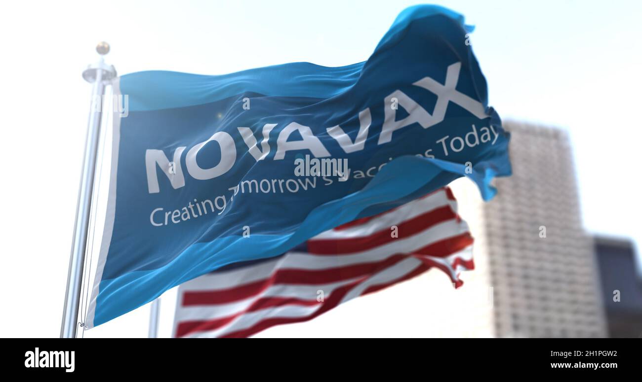 Gaithersburg, MD, USA, January 28, 2021: flag with the Novavax logo waving in the wind with the American flag in the background. Novavax announced dev Stock Photo