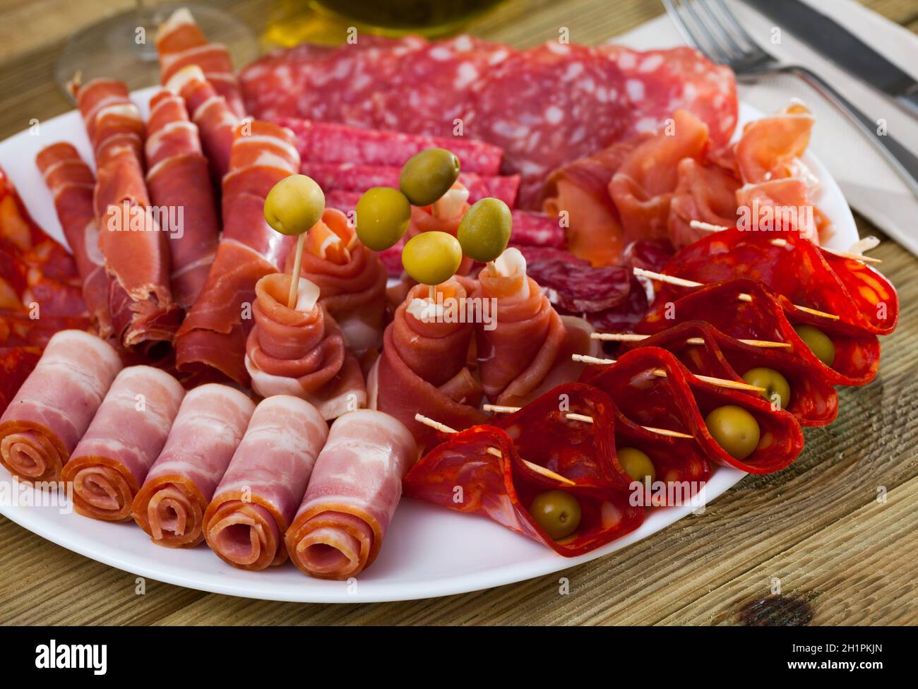 Spanish sausage sliced chorizo, fuet, jamon, salami, bacon Stock