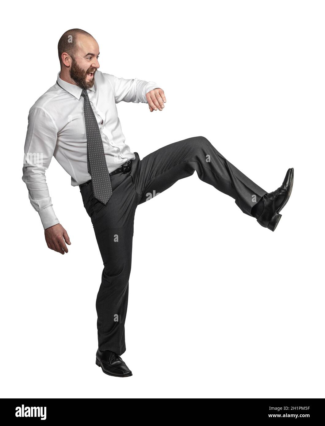 Man On A White Background Getting Kicked In The Behind Stock Photo, Picture  and Royalty Free Image. Image 7039705.