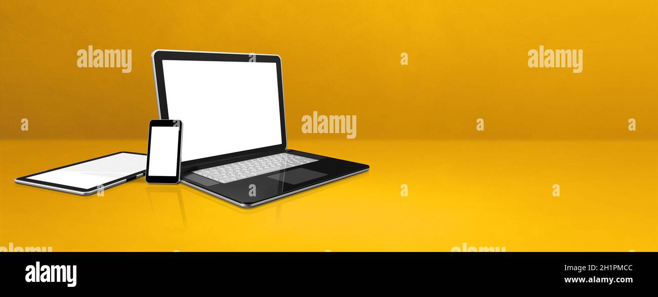 Laptop, mobile phone and digital tablet pc on yellow office desk. Banner background. 3D Illustration Stock Photo