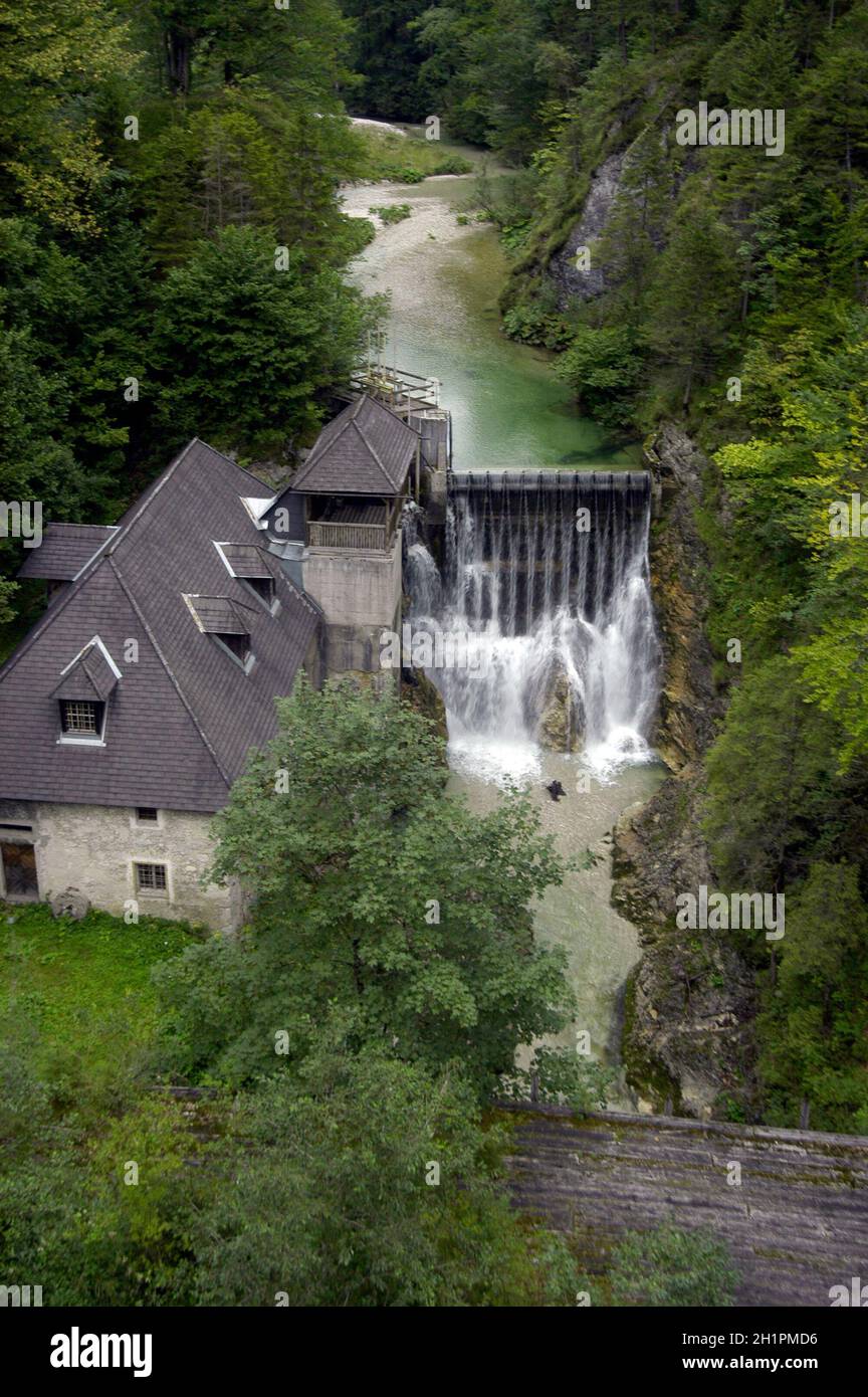 small hydroelectric power station in europe, with water basin nearby