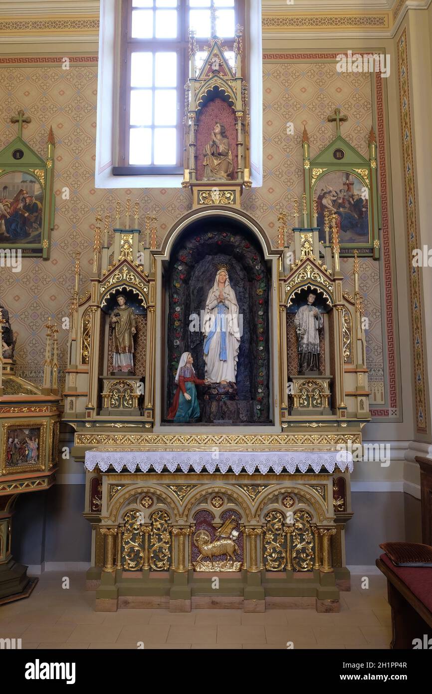 Altar of Our Lady of Lourdes in the church of Saint Matthew in Stitar, Croatia Stock Photo