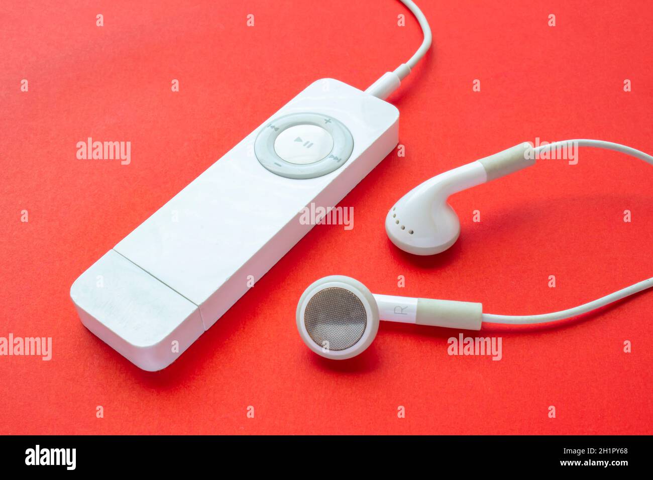 Calgary, Alberta, Canada. Feb 13, 2021. First-generation iPod Shuffle. A digital audio player designed and formerly marketed by Apple. The smallest mo Stock Photo