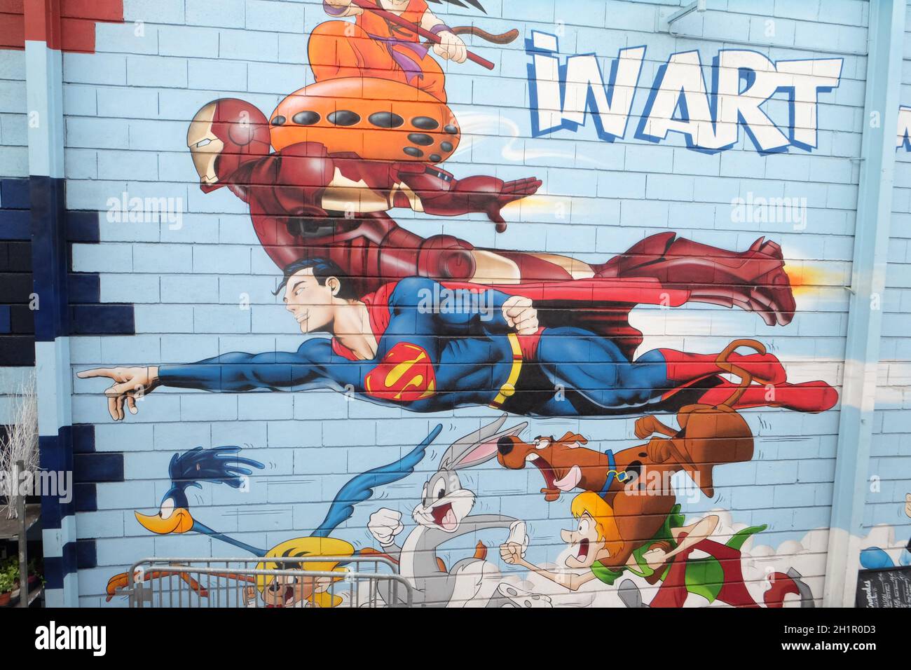 Superman, graffiti wall mural comic book, flea market, St. Ouen Clignancourt in Paris, France Stock Photo