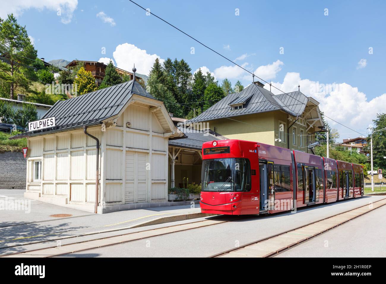 Fulpmes, Austria - August 1, 2020: Stubaitalbahn Innsbruck Tram train Fulpmes station in Austria. Stock Photo