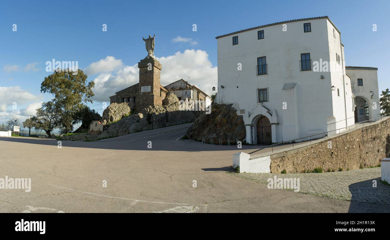 Caceres, Spain - Dec 29th, 2020: Sanctuary of the Virgen de la Montana, Caceres, Extremadura, Spain. Facilities and Statue of Jesus with Open Arms Stock Photo
