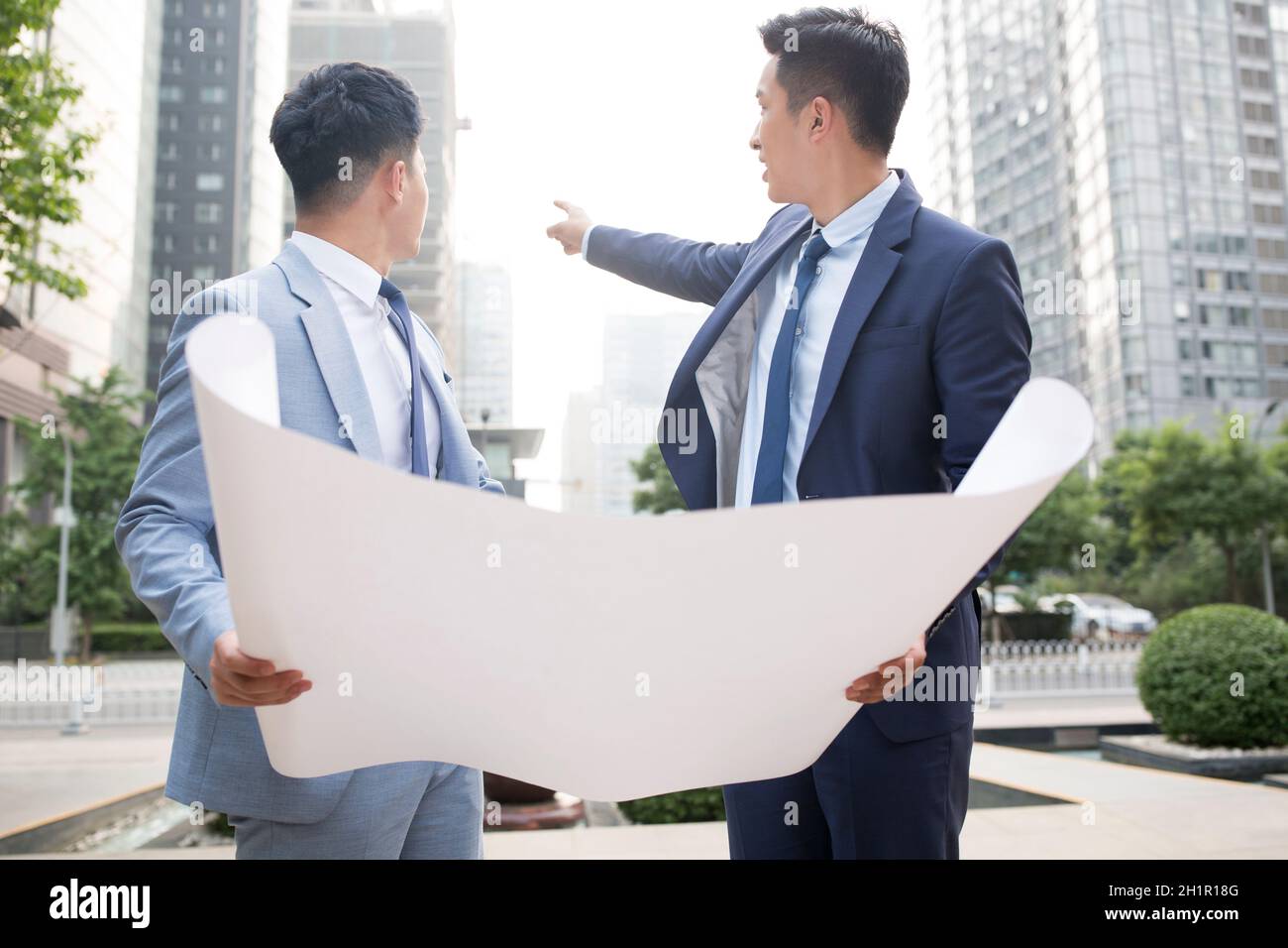 Architects discussing their work Stock Photo