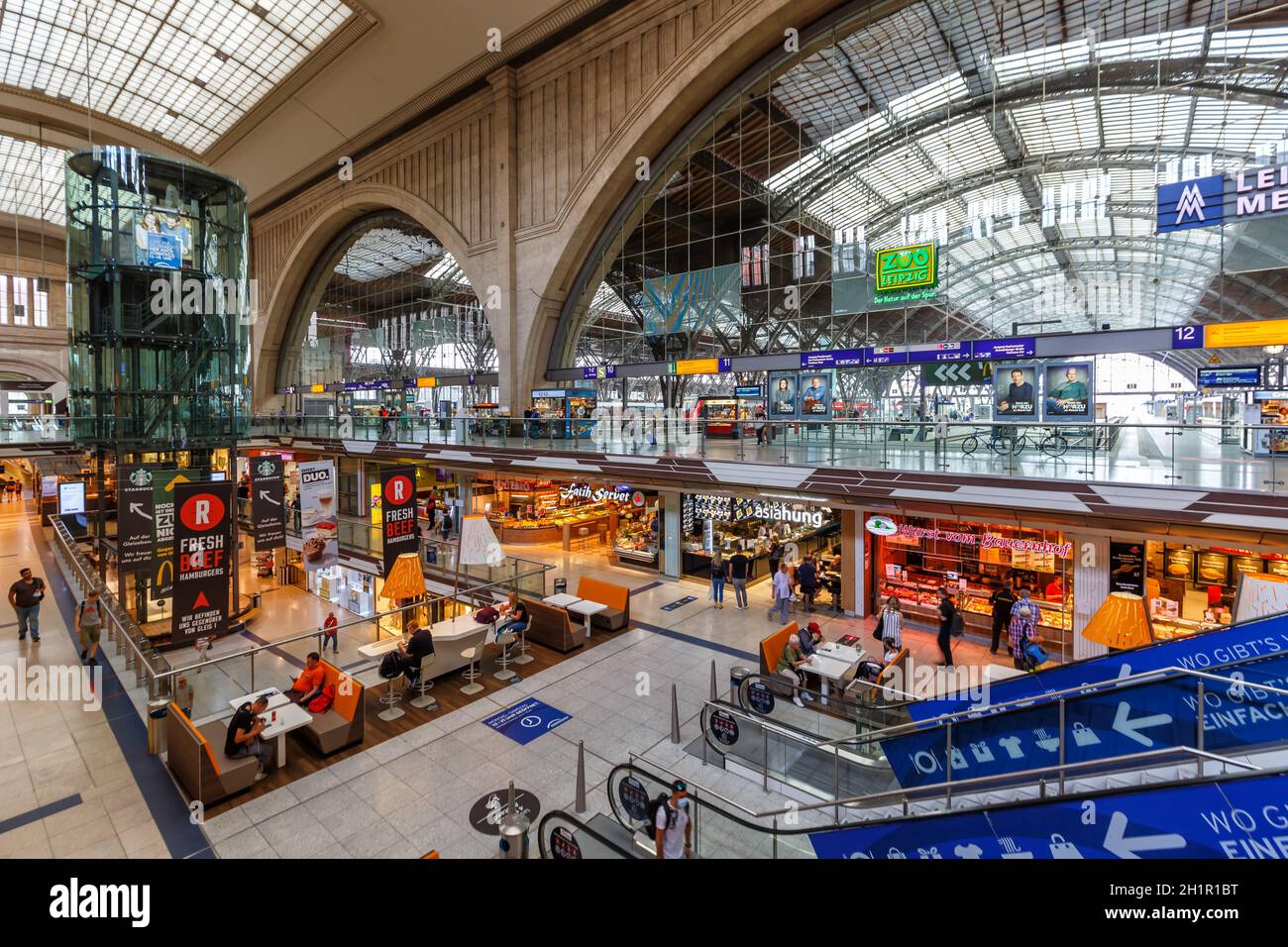 Leipzig, Germany - August 19, 2020: Leipzig main railway station Hauptbahnhof Hbf Deutsche Bahn DB hall shops in Germany. Stock Photo