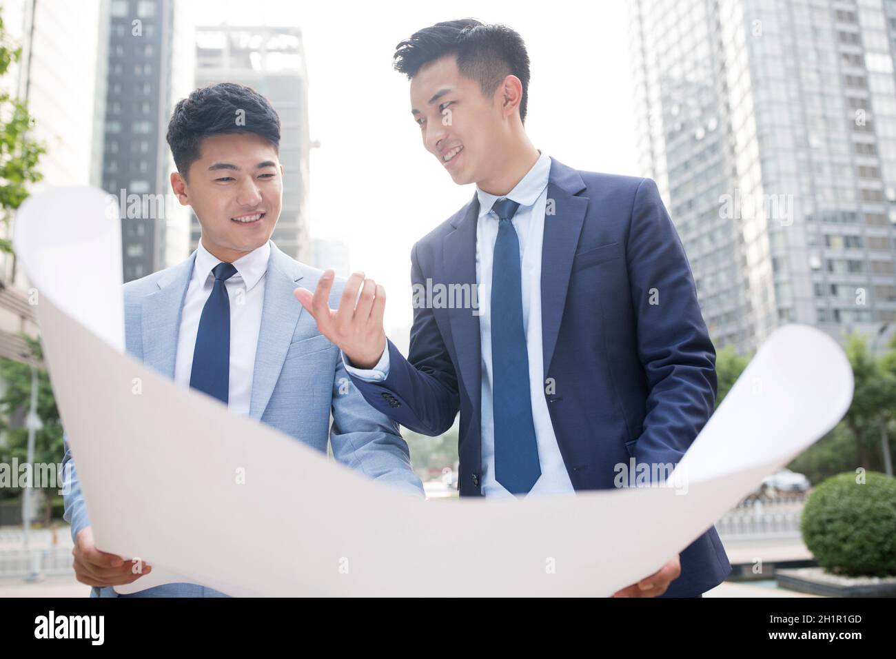 Architects discussing their work Stock Photo