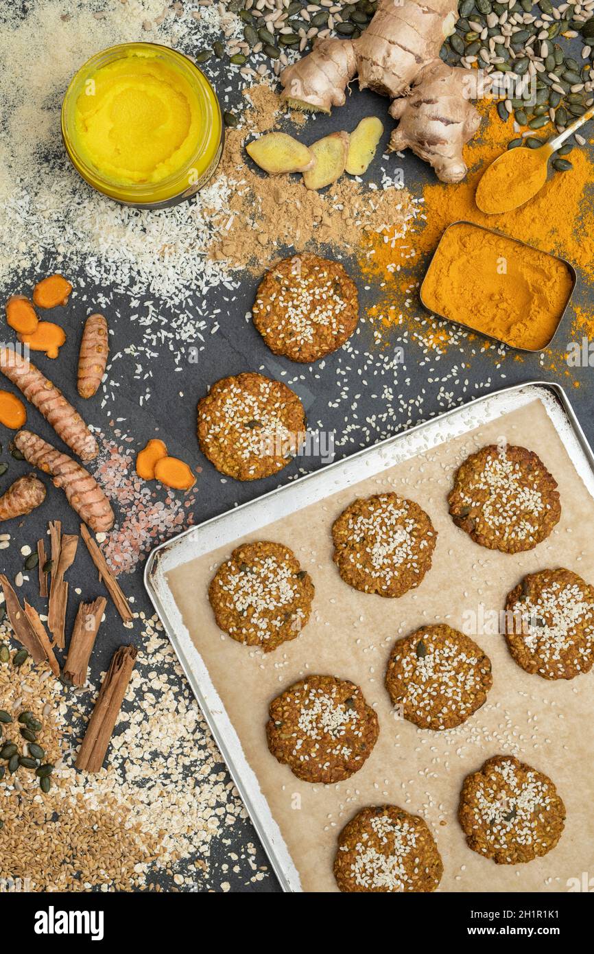 Homemade Golden Ginger and Turmeric Cookies with Ingredients Stock Photo