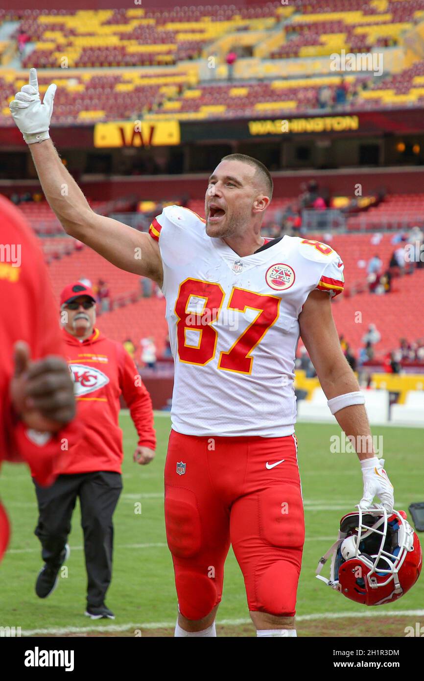 Sunday, October 17, 2021; Landover, MD, USA; Kansas City Chiefs tight end Travis Kelce (87) celebrates the win as he heads to the locker room after an Stock Photo