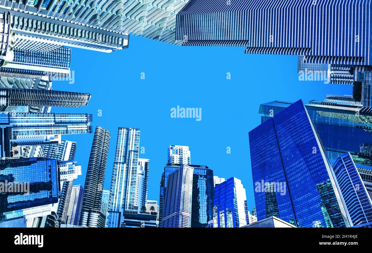 Downtown Miami cityscape view with condos and office buildings against blue sky. Stock Photo