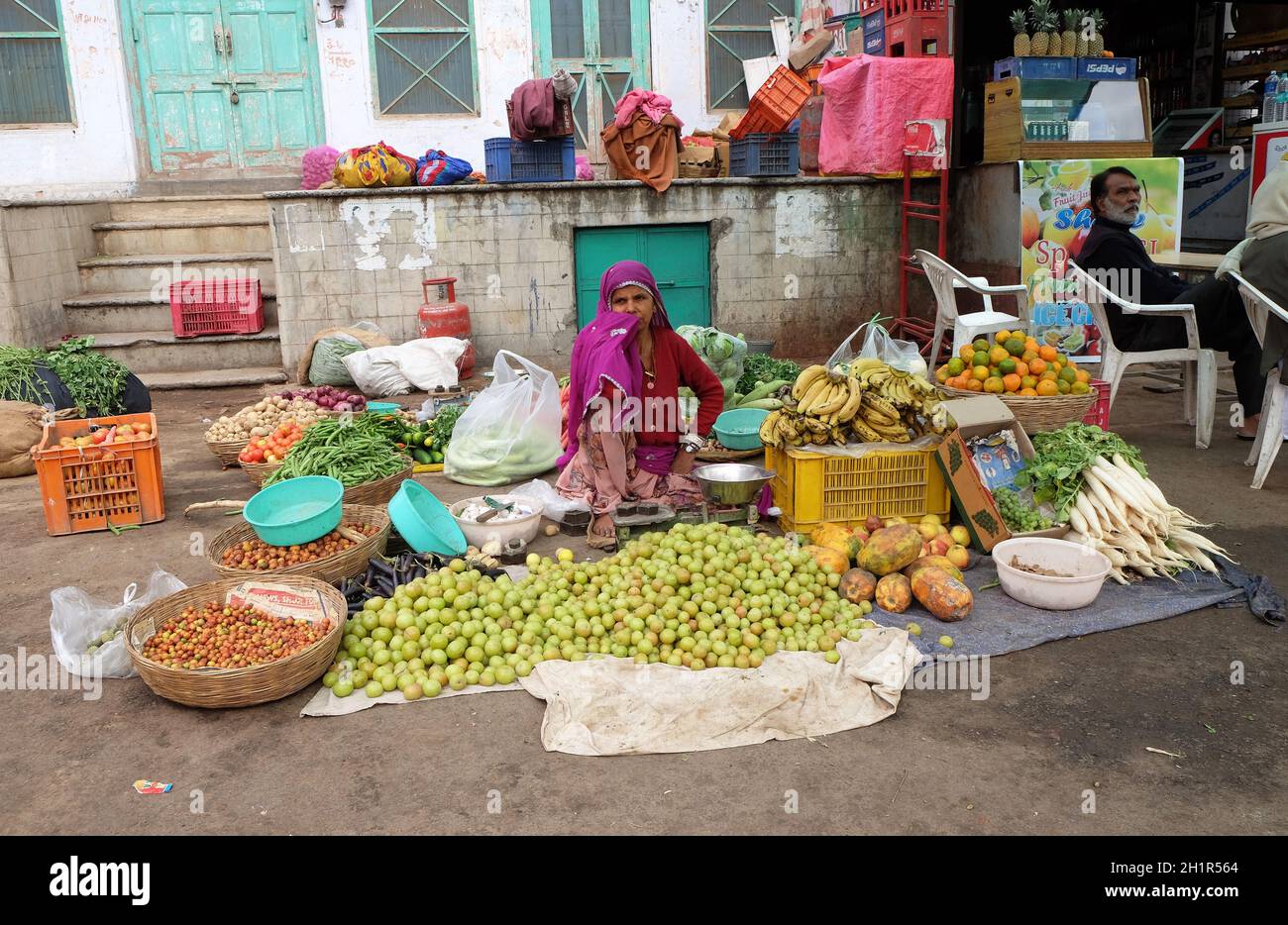 Woman Selling Fruit And Veg At A Street Market In Pushkar Rajasthan India Stock Photo Alamy