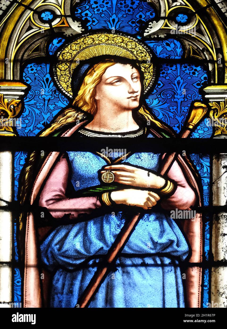 Saint Genevieve, stained glass window in the Basilica of Saint Clotilde in Paris, France Stock Photo