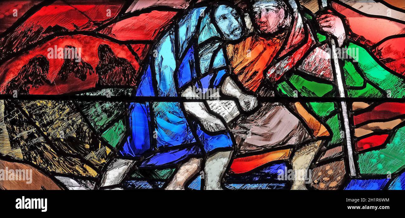 God’s promise gives men courage and hope in the path of their lives and salvation, detail of stained glass window by Sieger Koder in St. John church i Stock Photo